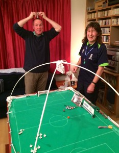 Alan celebrates Chelsea’s cup win. The Queen and Prince Philip, and Rob, look on